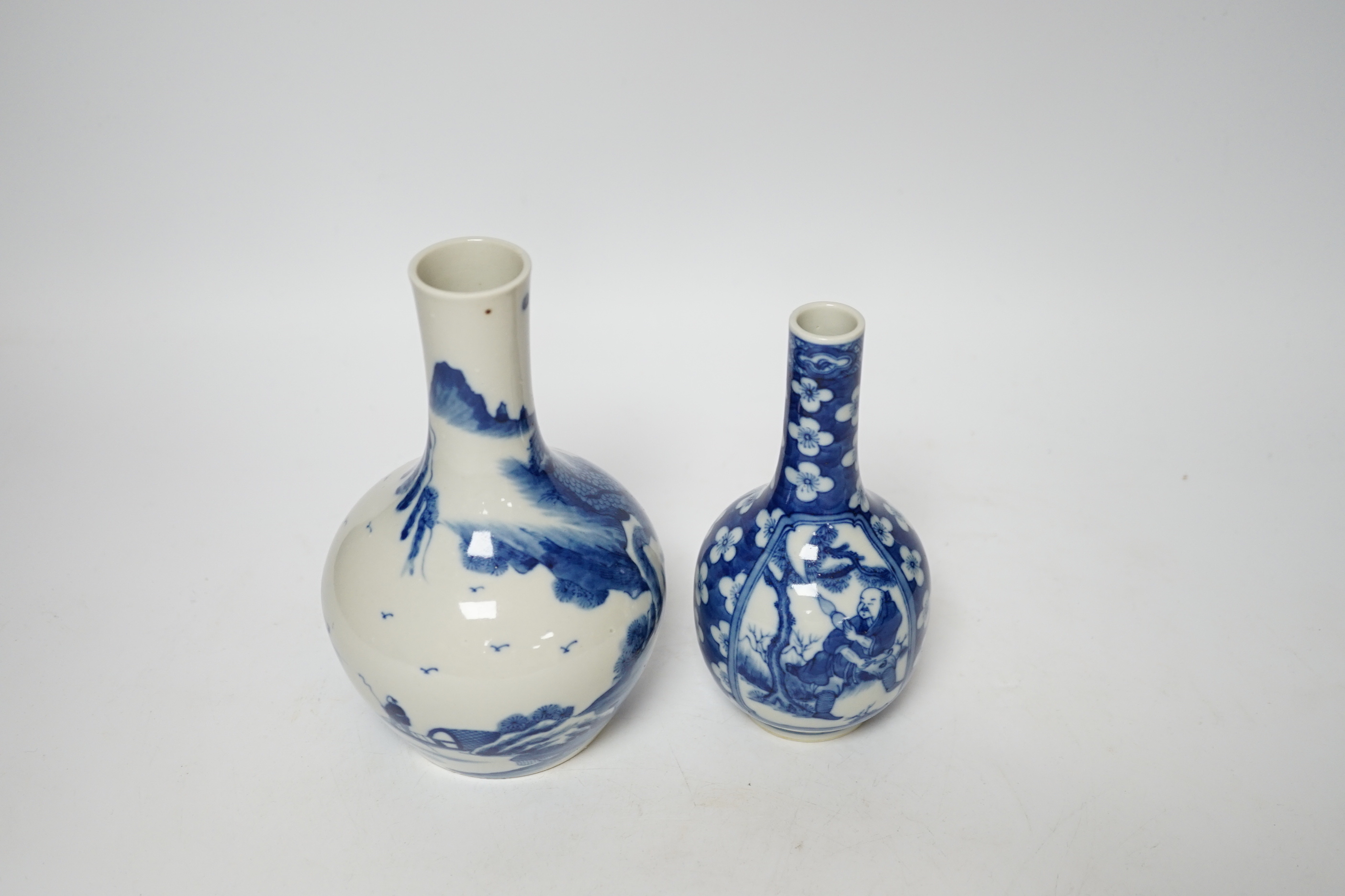 Two Chinese blue and white bottle vases, tallest 17cm